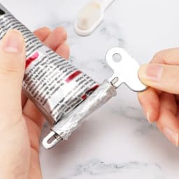 الفولاذ المقاوم للصدأ معجون الأسنان عصارة أداة زيت الشعر الطلاء عصارة تدوير موزع للمراهم مستحضرات التجميل اكسسوارات الحمام
