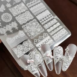 قطعة واحدة قالب طباعة أظافر من الفولاذ المقاوم للصدأ بتصميم زهرة الفراشة والدانتيل الفرنسي، شبكة مجوفة للطباعة، قالب أظافر DIY بتصميمات هندسية للمانيكير